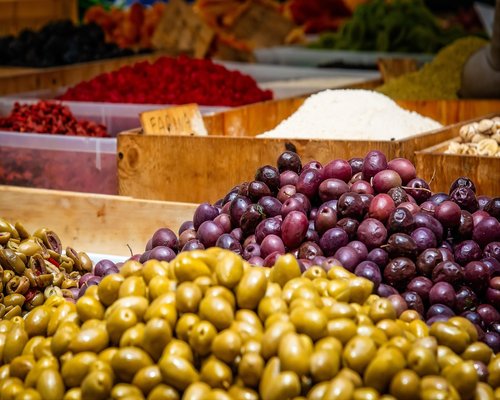 Fresh traditional Malaysian herbs and greens sold at a local morning street market